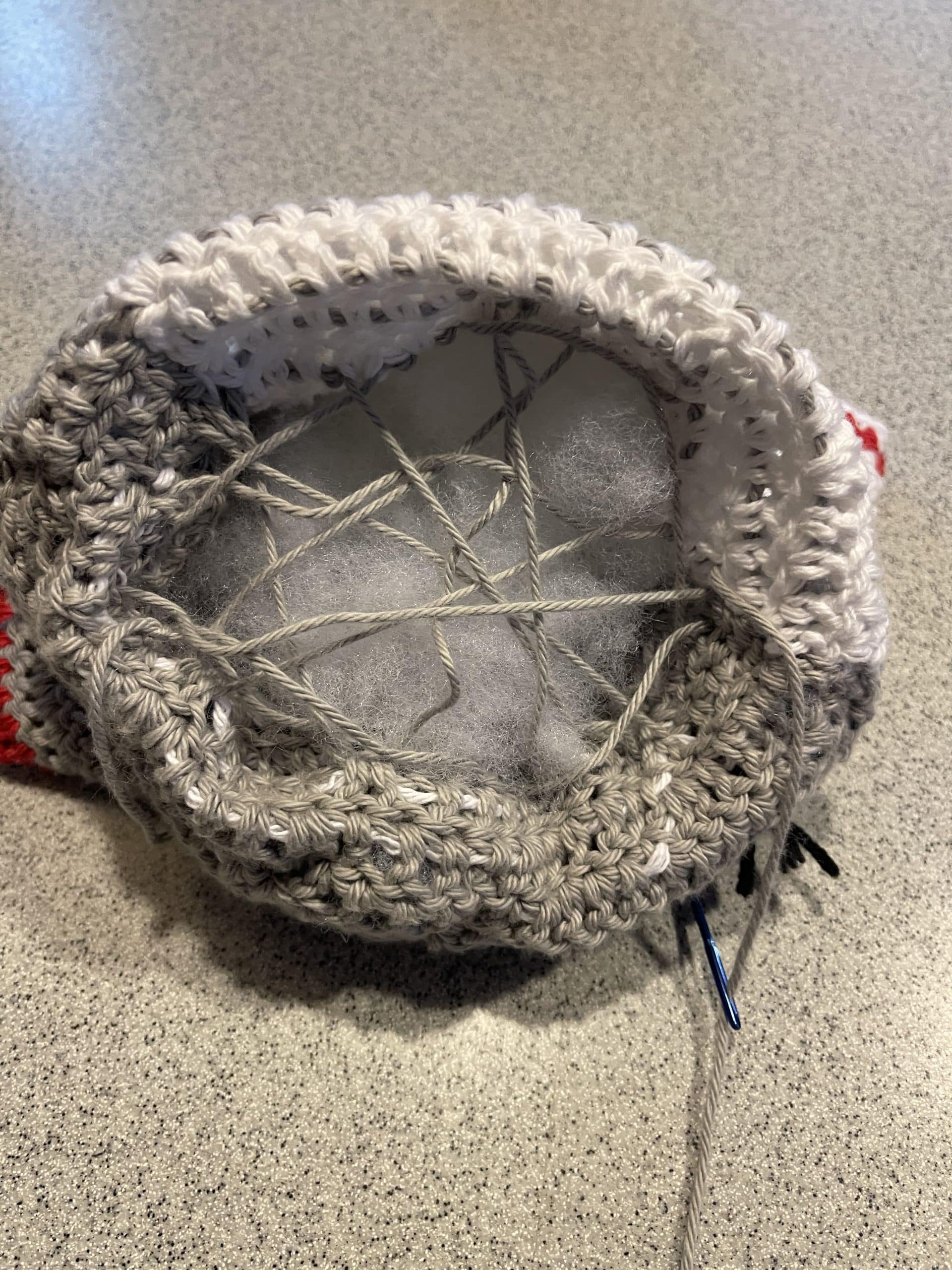 web of yarn to keep stuffing in