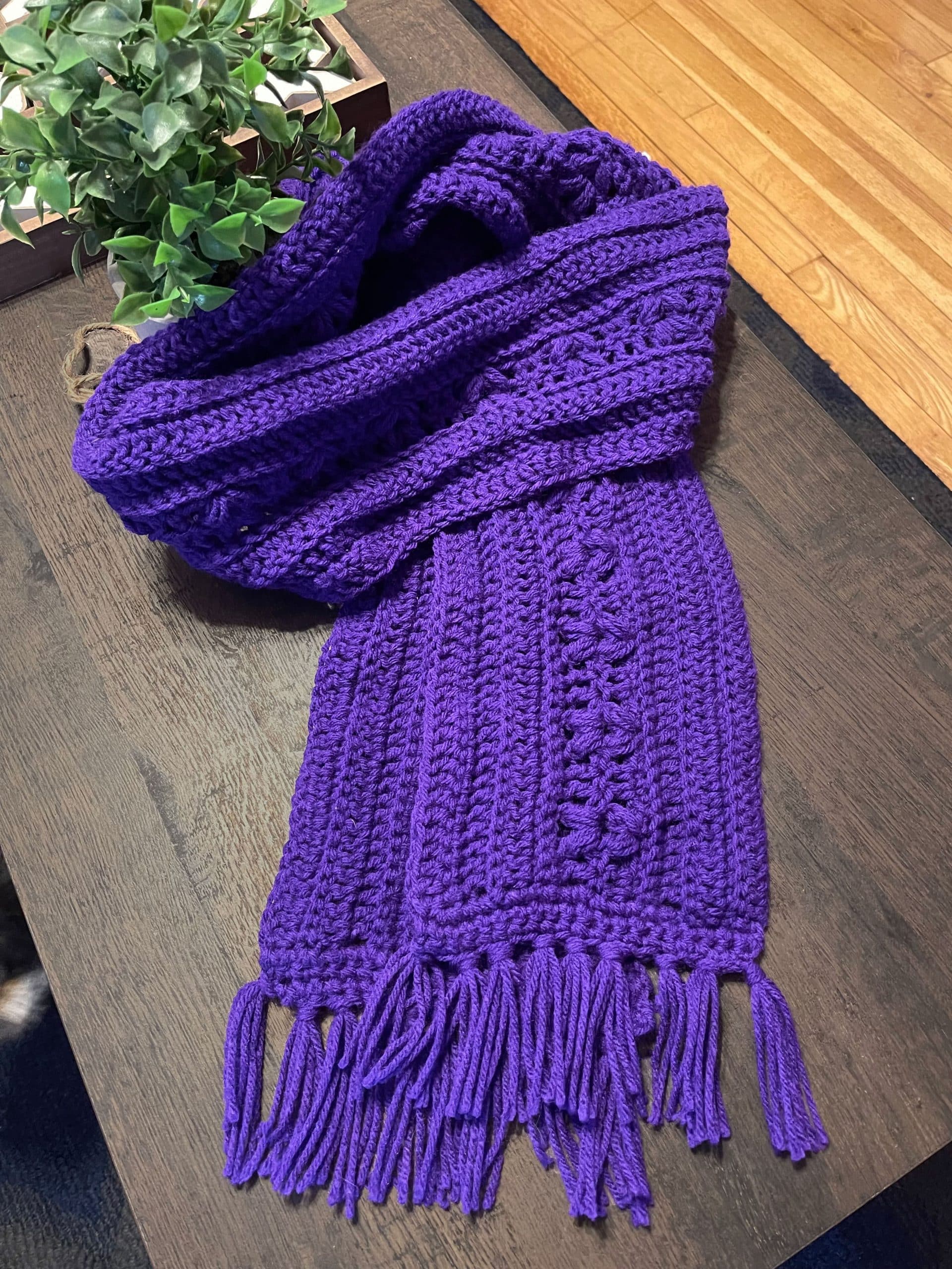 Purple scarf on table